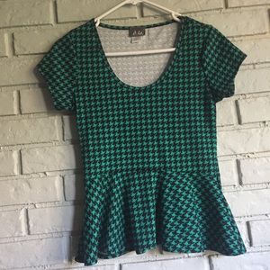 Green and black peplum top
